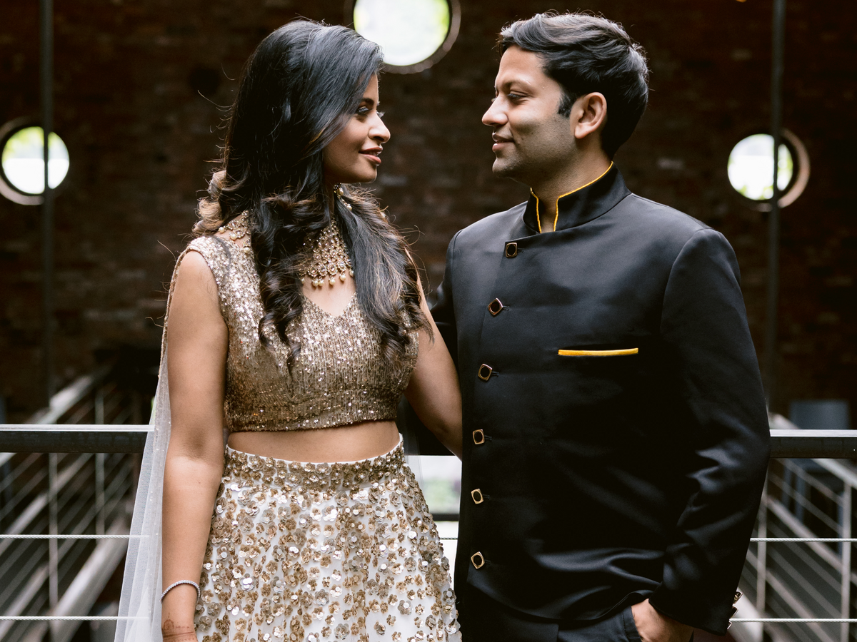 Black and Gold Reception Wear with HK Couple Sanketa & Vish
