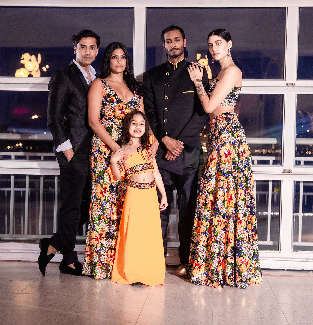 Matching Indian Family Outfits at Wedding Reception