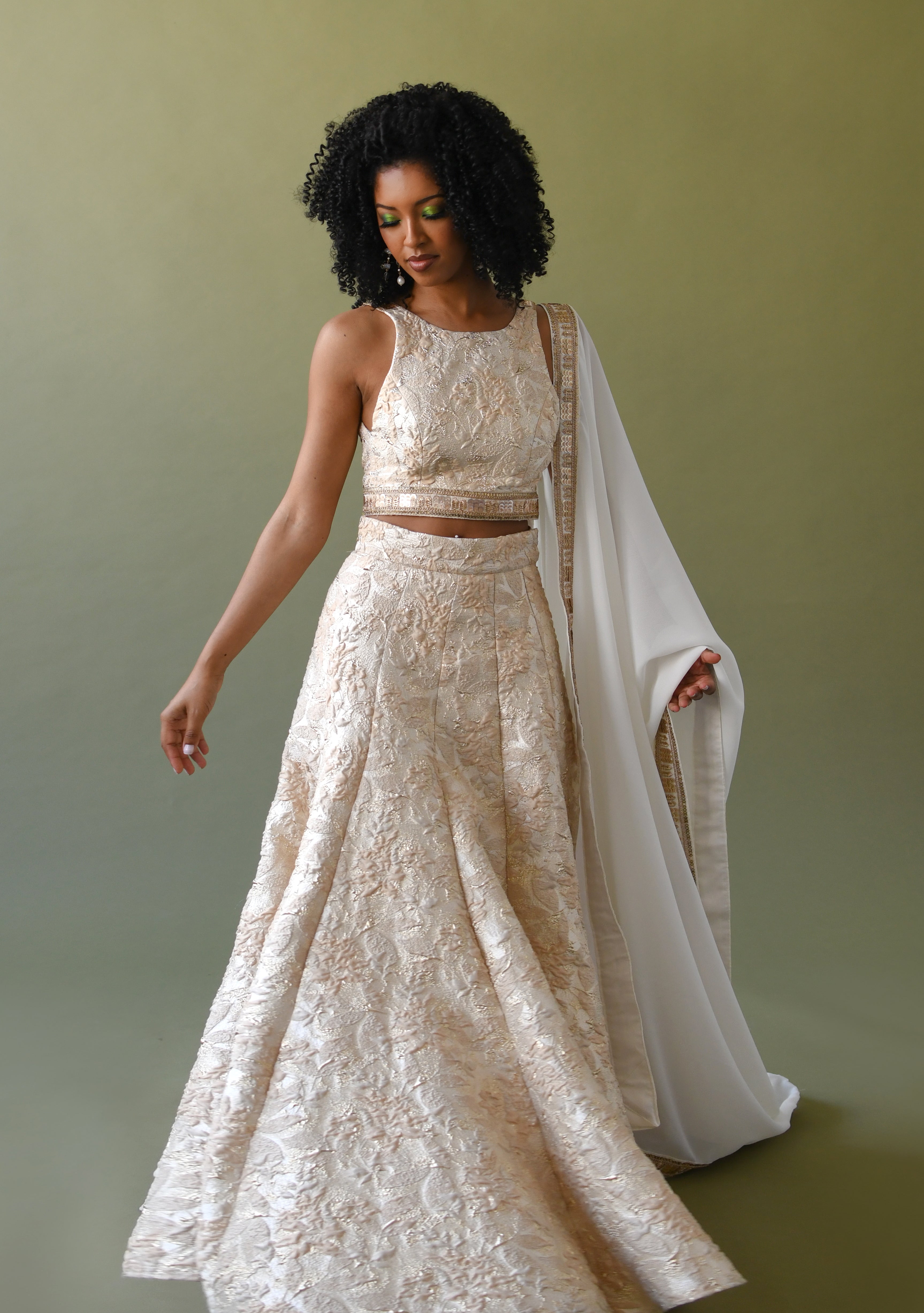 Ivory and gold bridal lehenga discount