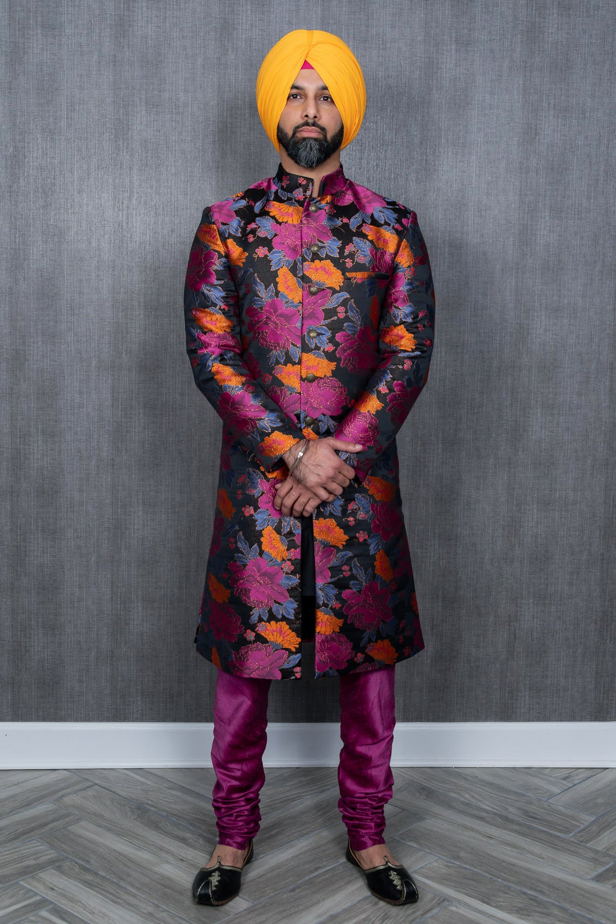 Colorful floral sherwani jacket with purple pajama pant and yellow turban