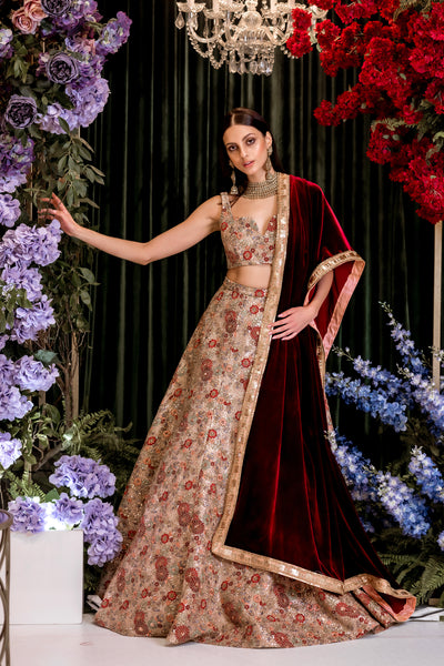 Stunning bridal lehenga in gold and burgundy