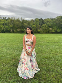 Briyana in the square neck Geena Top and long flowy Karishma Skirt in cream Caribbean floral print
