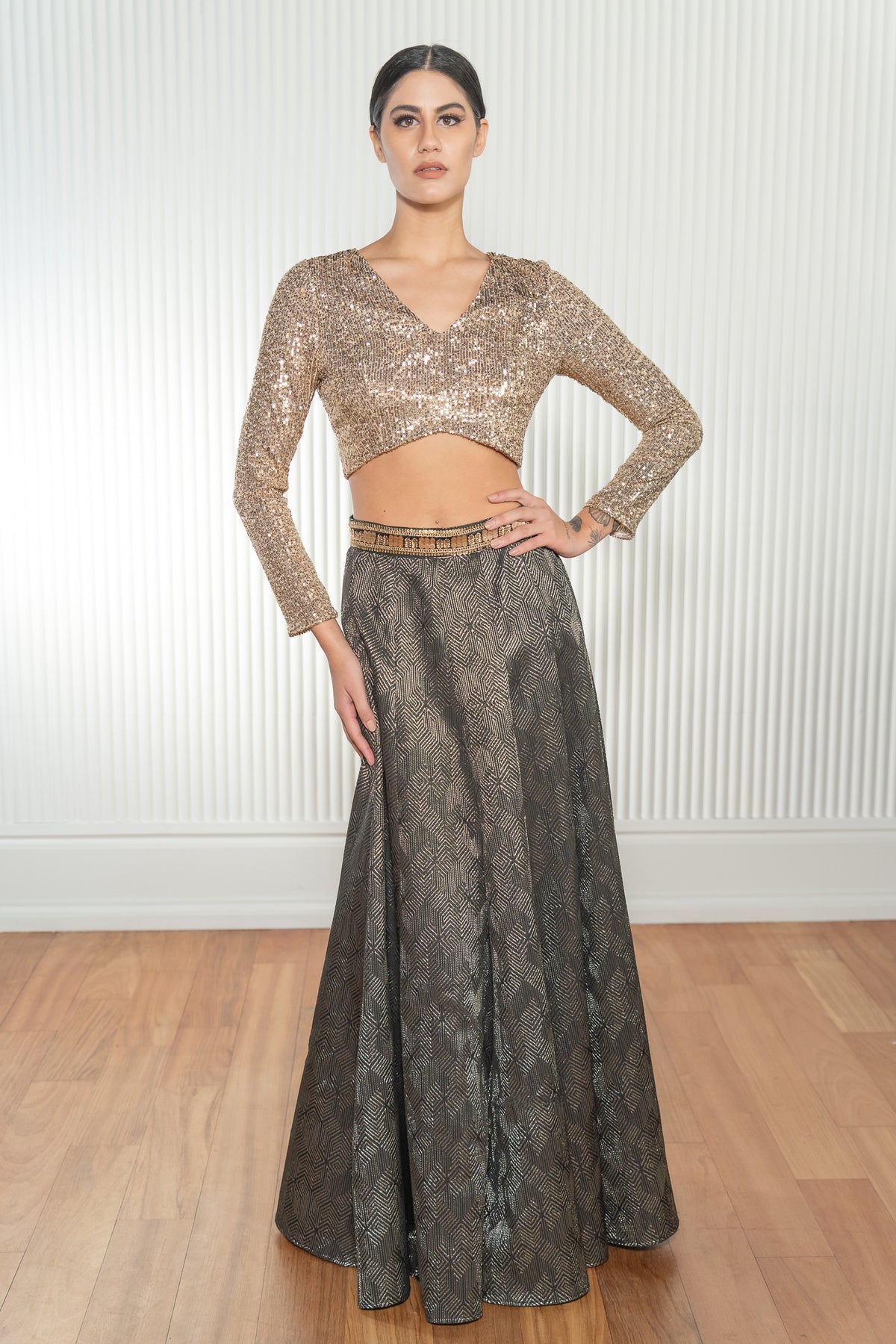 Metallic Black Diamond Maze Jacquard Lehenga Skirt with a Gold Sequin Trim on the Waist - Front View - Harleen Kaur