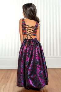 Satya wearing the Nya metallic jacquard lehenga skirt in bold magentas, purples, and blues with an elastic waistband - Back View - Harleen Kaur