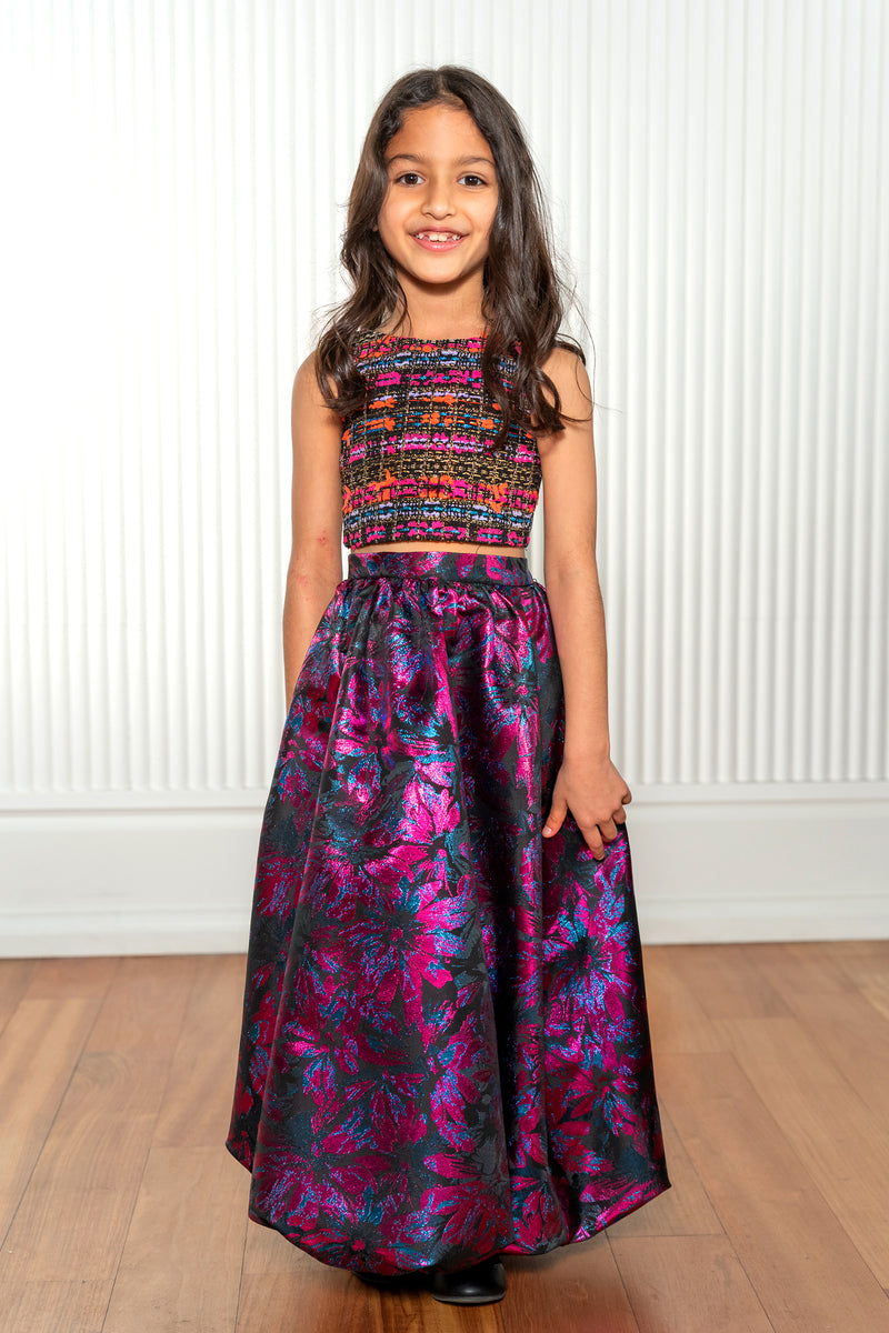 Satya wearing the Nya metallic jacquard lehenga skirt in bold magentas, purples, and blues with an elastic waistband - Front View - Harleen Kaur