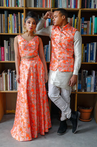ANEELA Neon Orange Jacquard Skirt with Gold Flora Details - Front View - Harleen Kaur