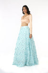 NIDA Peach Stretch Satin Long Sleeve Crop Top with Geometric Open Back - Side View | HARLEEN KAUR